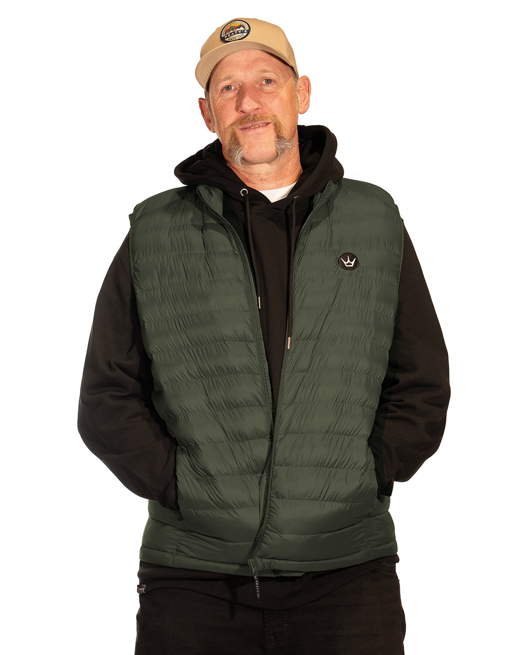 Steve wearing khaki Grenoside Gilet over a black hoodie, front view